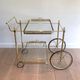 Brass rolling table with removable double trays from Maison Jansen.