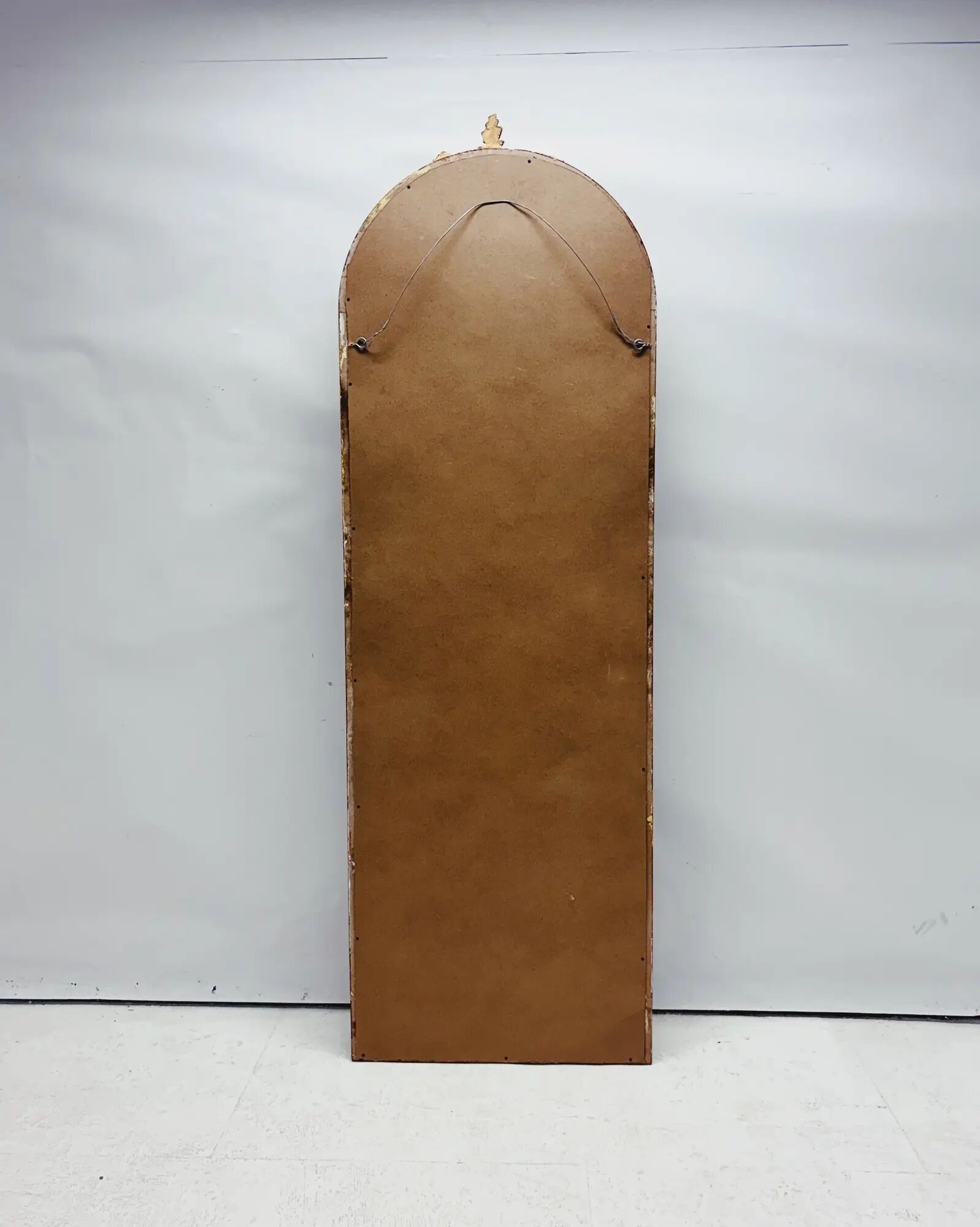 Large gold full-length mirror with ornate crest