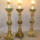 Suite de 3 pique cierges montés en lampe bronze
