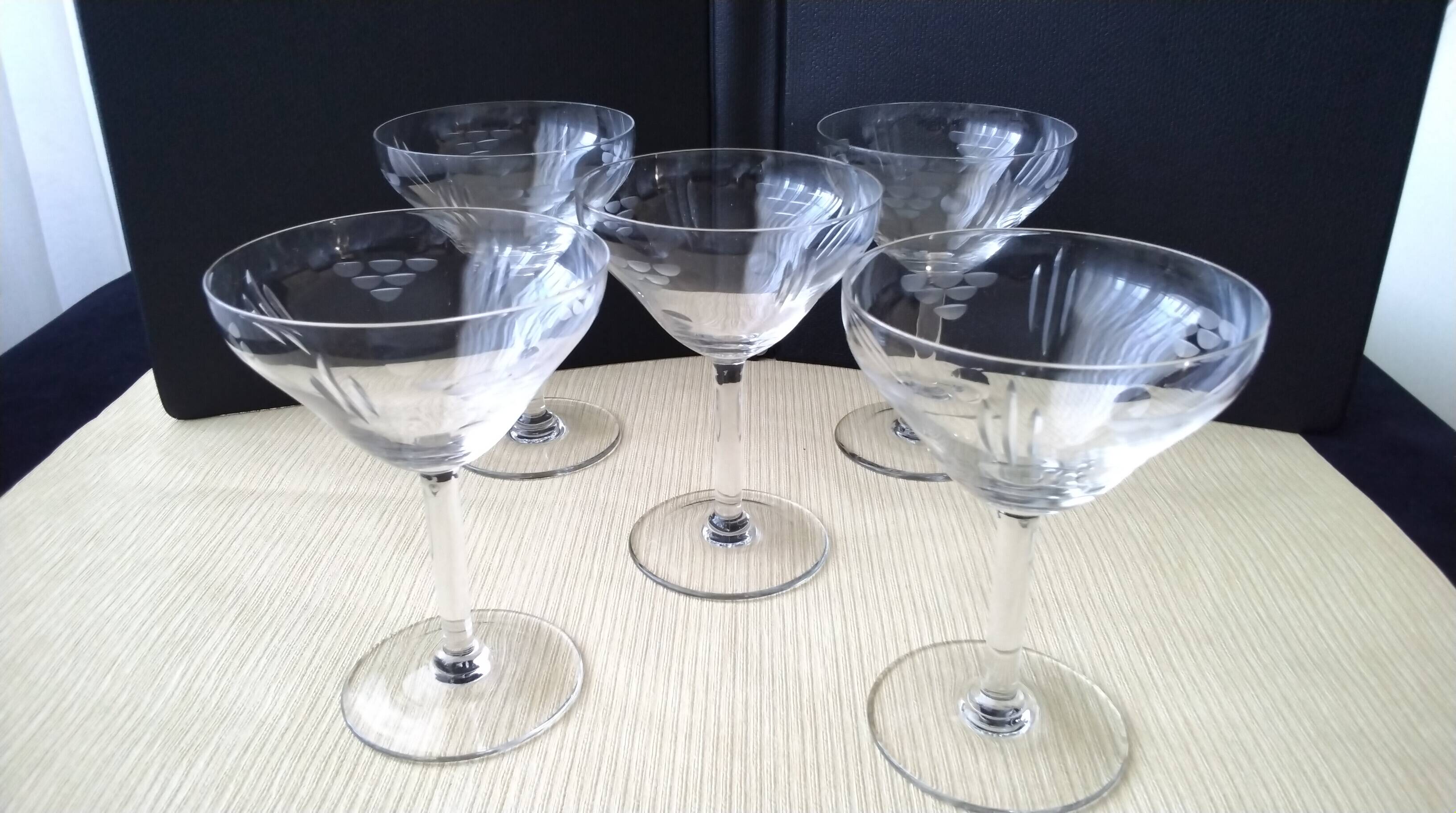 5 Vintage glass champagne coupes with engraved decoration