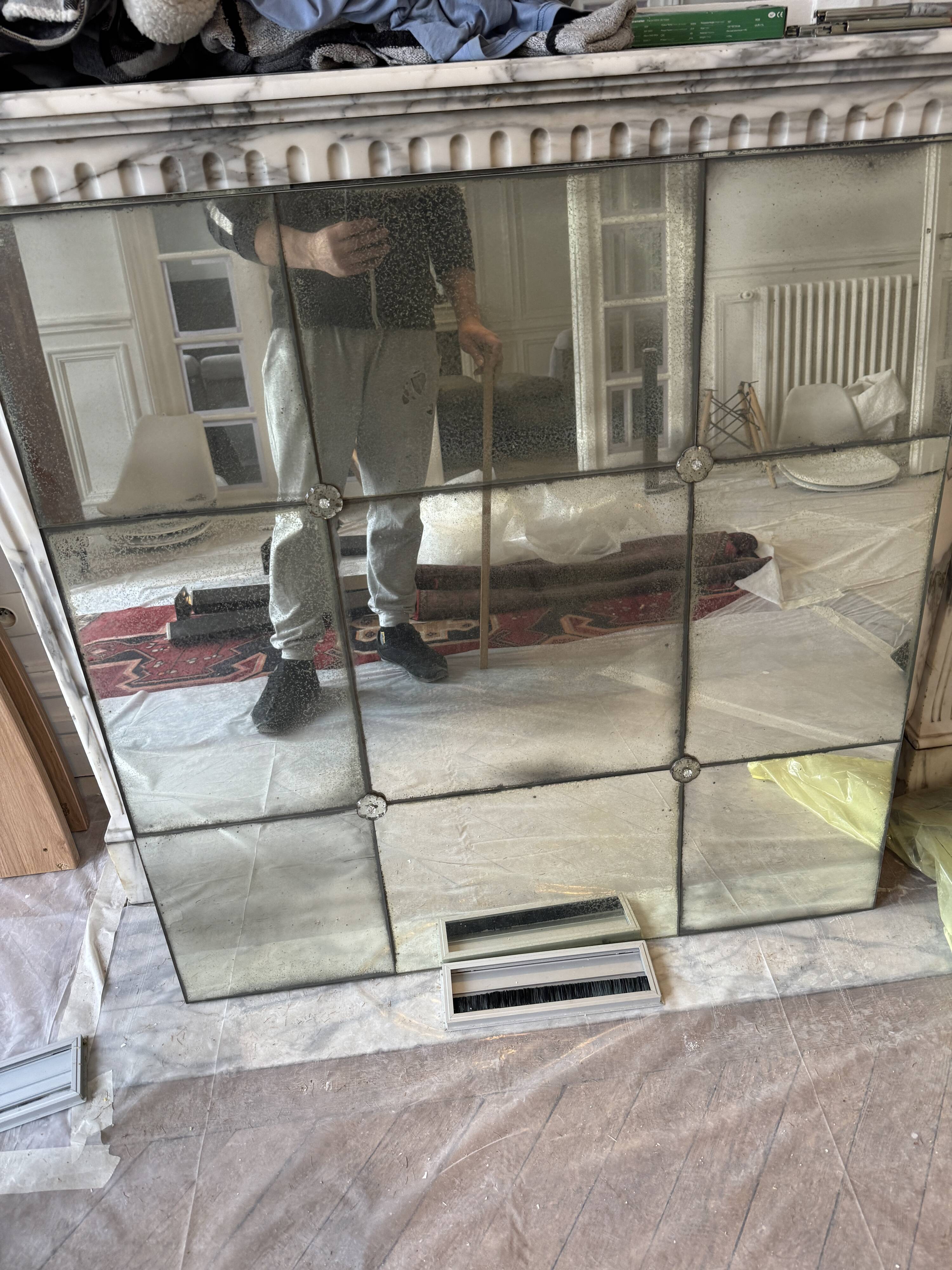 Large industrial-style mirror with glazing bars.
