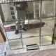 Large industrial-style mirror with glazing bars.