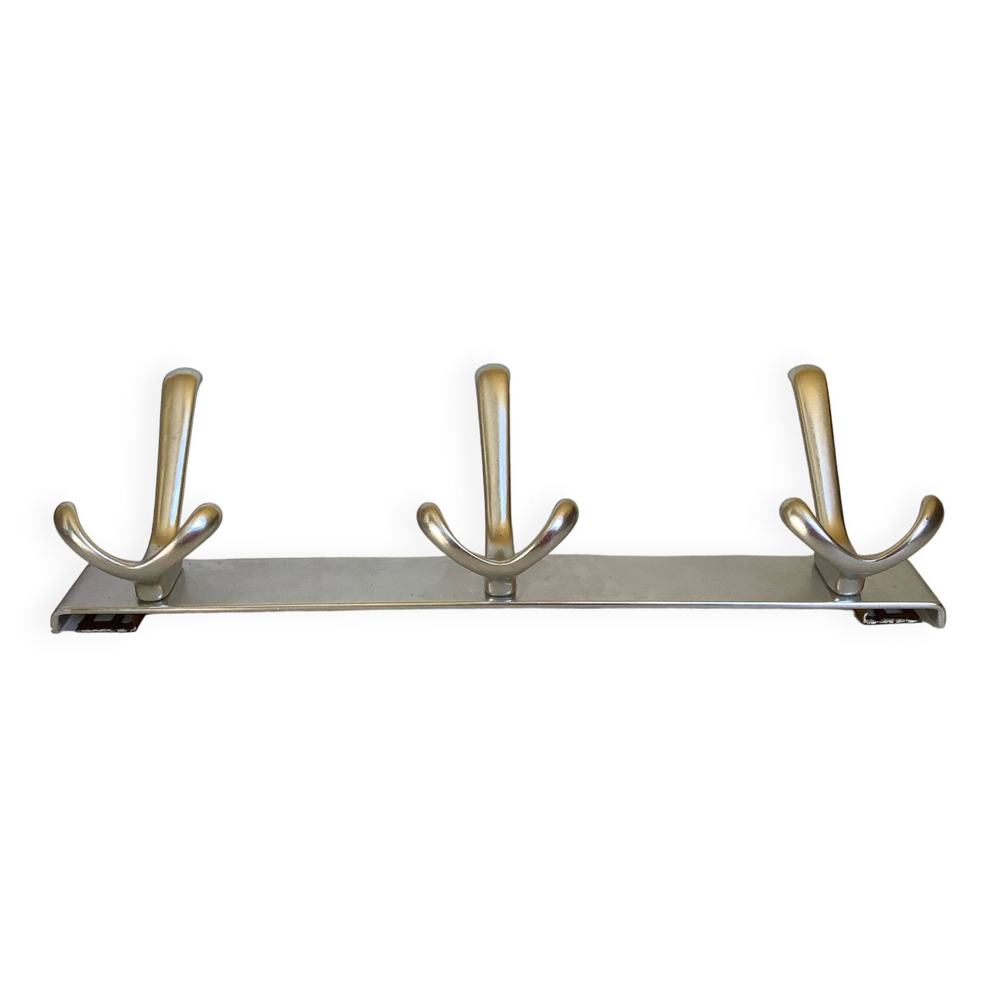 Stainless steel coat rack with three double hooks.