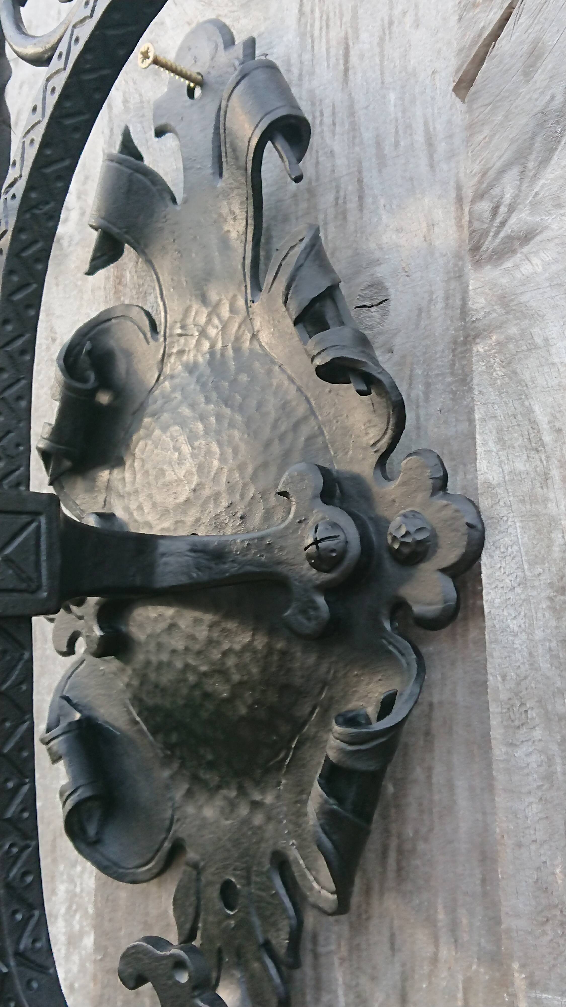 Pair of black wrought iron sconces - neo-Gothic style - from the 1950s