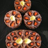 Service of 12 plates in oyster slip and its serving dish