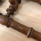 Wooden coat rack with swivel hooks