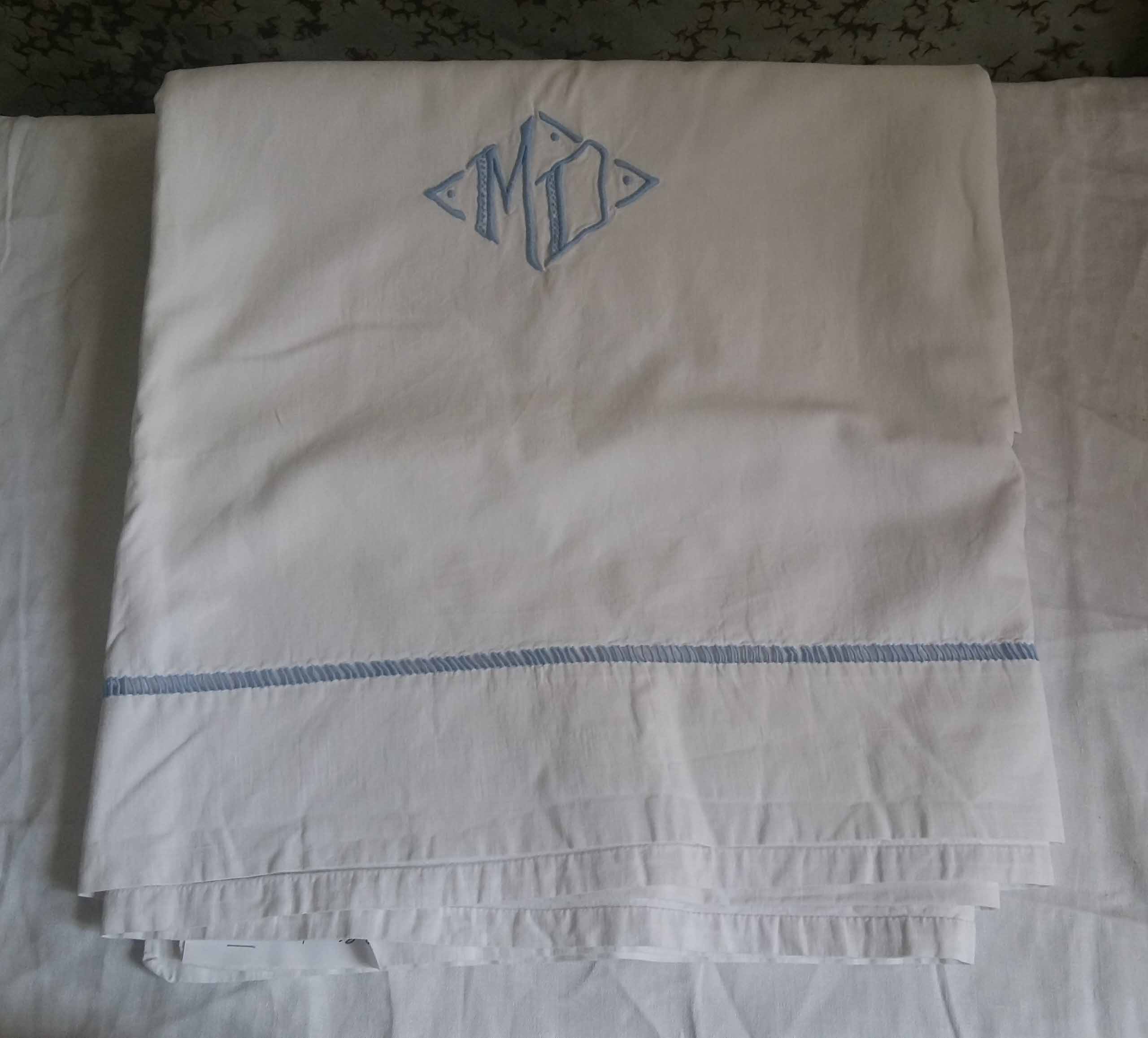 old embroidered cotton sheet
