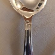 Silver cutlery set for 36 place settings and its ladle.