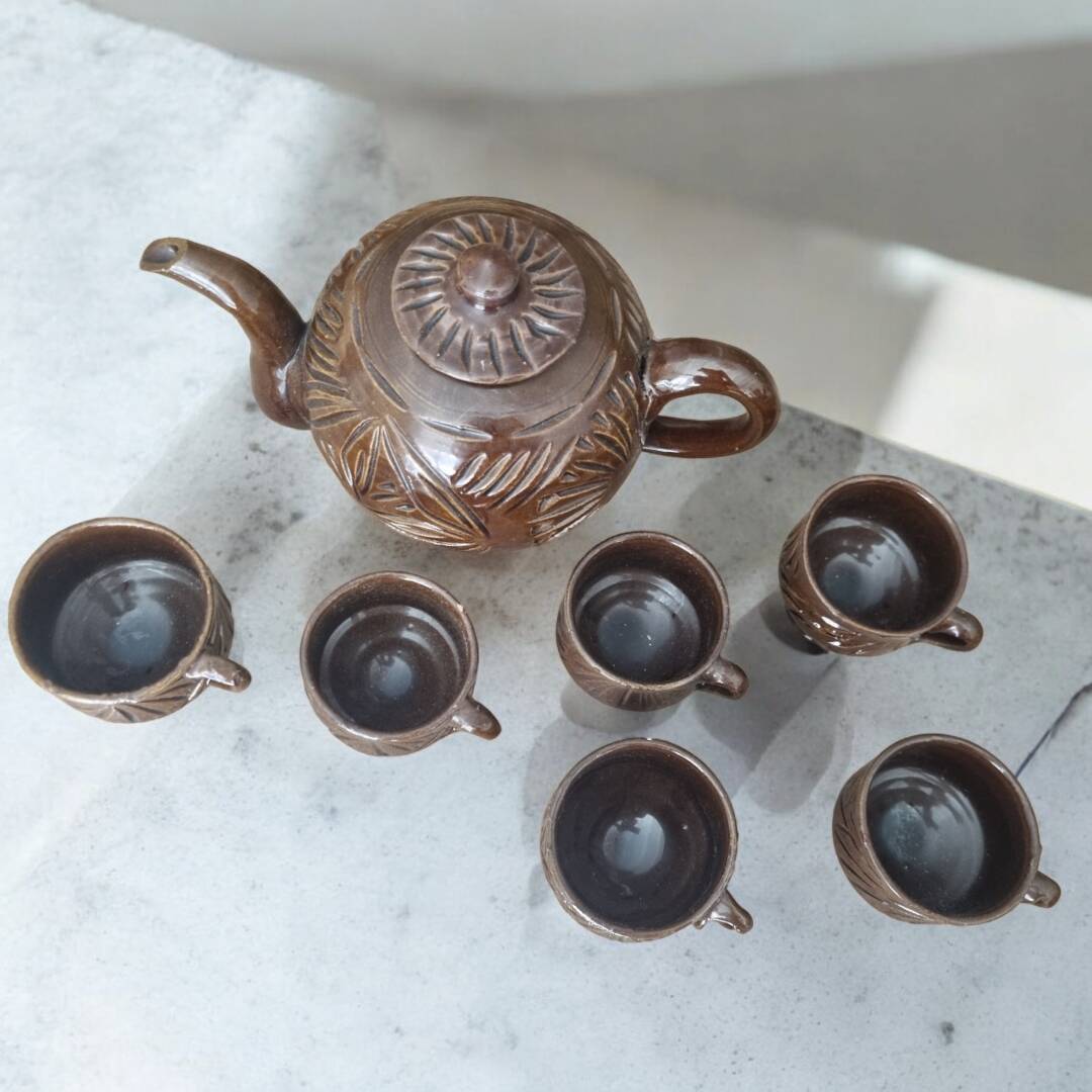 Brown glazed terracotta coffee service