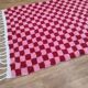 Handmade pure wool rug in traditional pink and red, 150/250 cm.