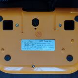 Vintage orange telic phone with ptt dial