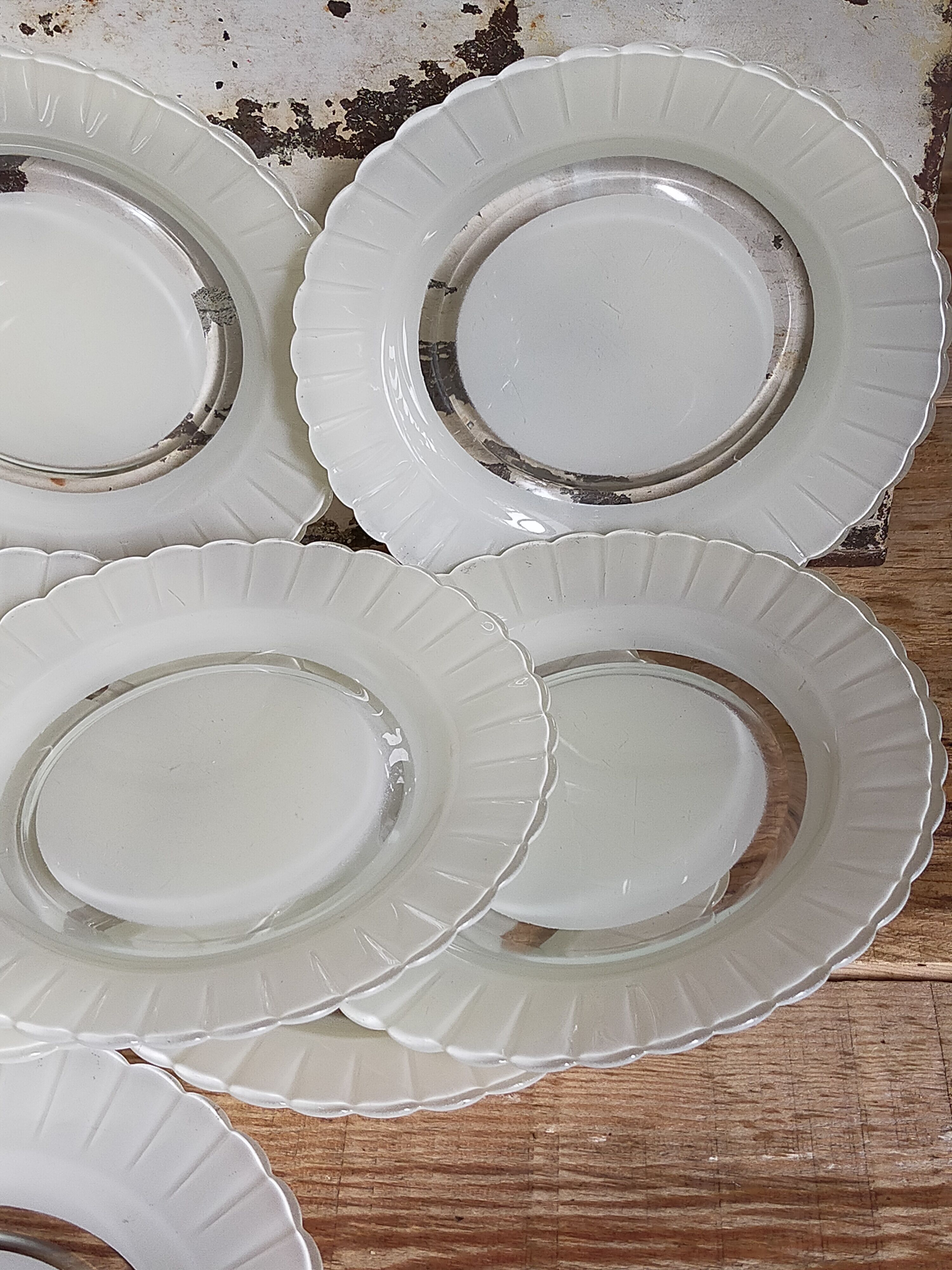 Eight Duralex dessert plates in 60s painted glass
