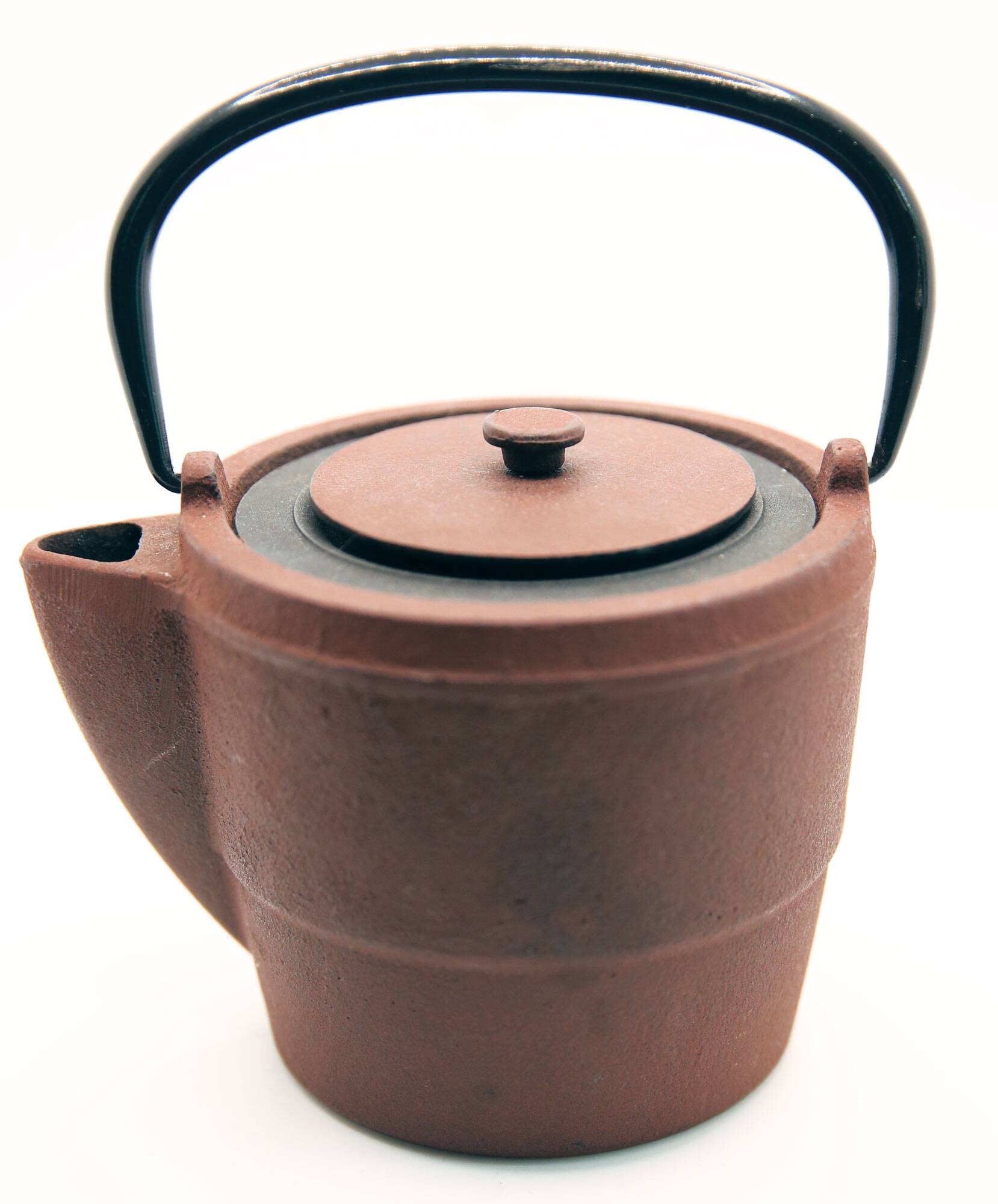 Cast iron chocolate teapot from Japan wabi sabi and its stainless steel filter