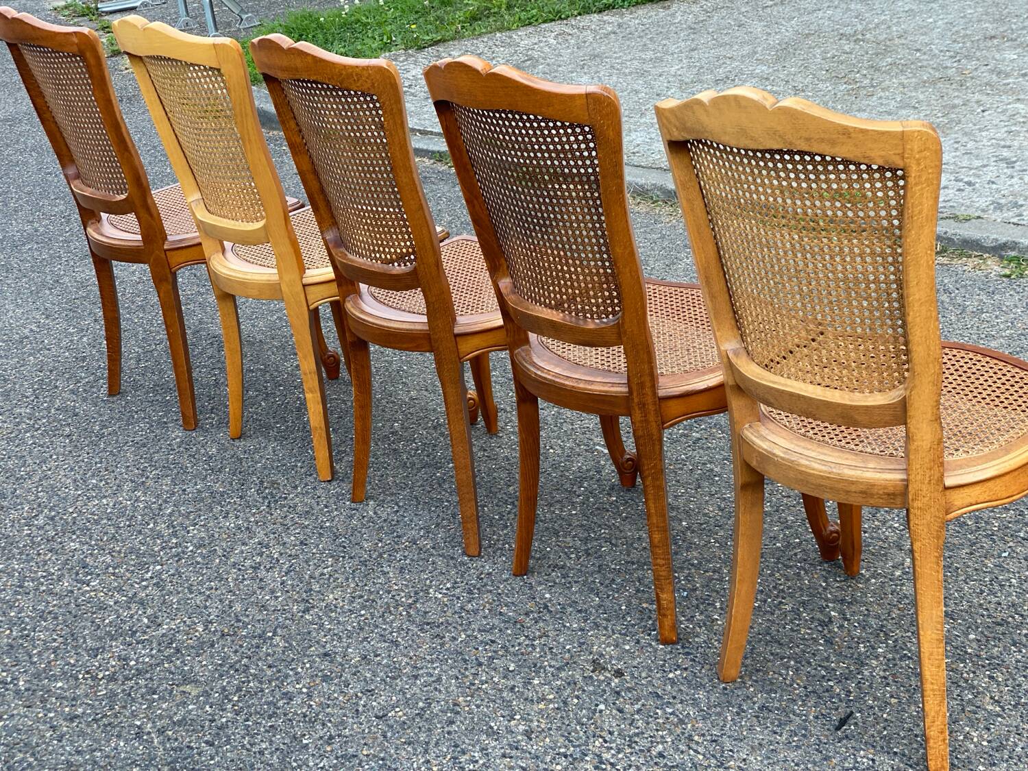 5 solid wood caned chairs, Louis XV style, stamped Baumann