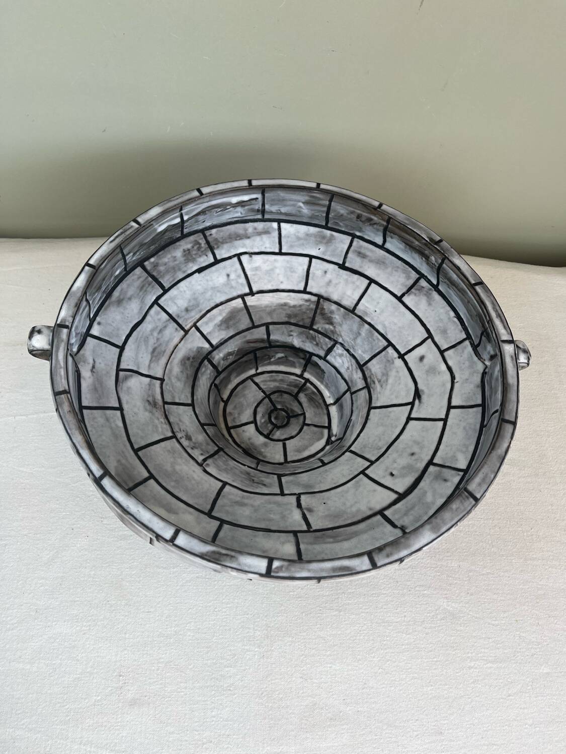 Handcrafted glazed ceramic architectural cup