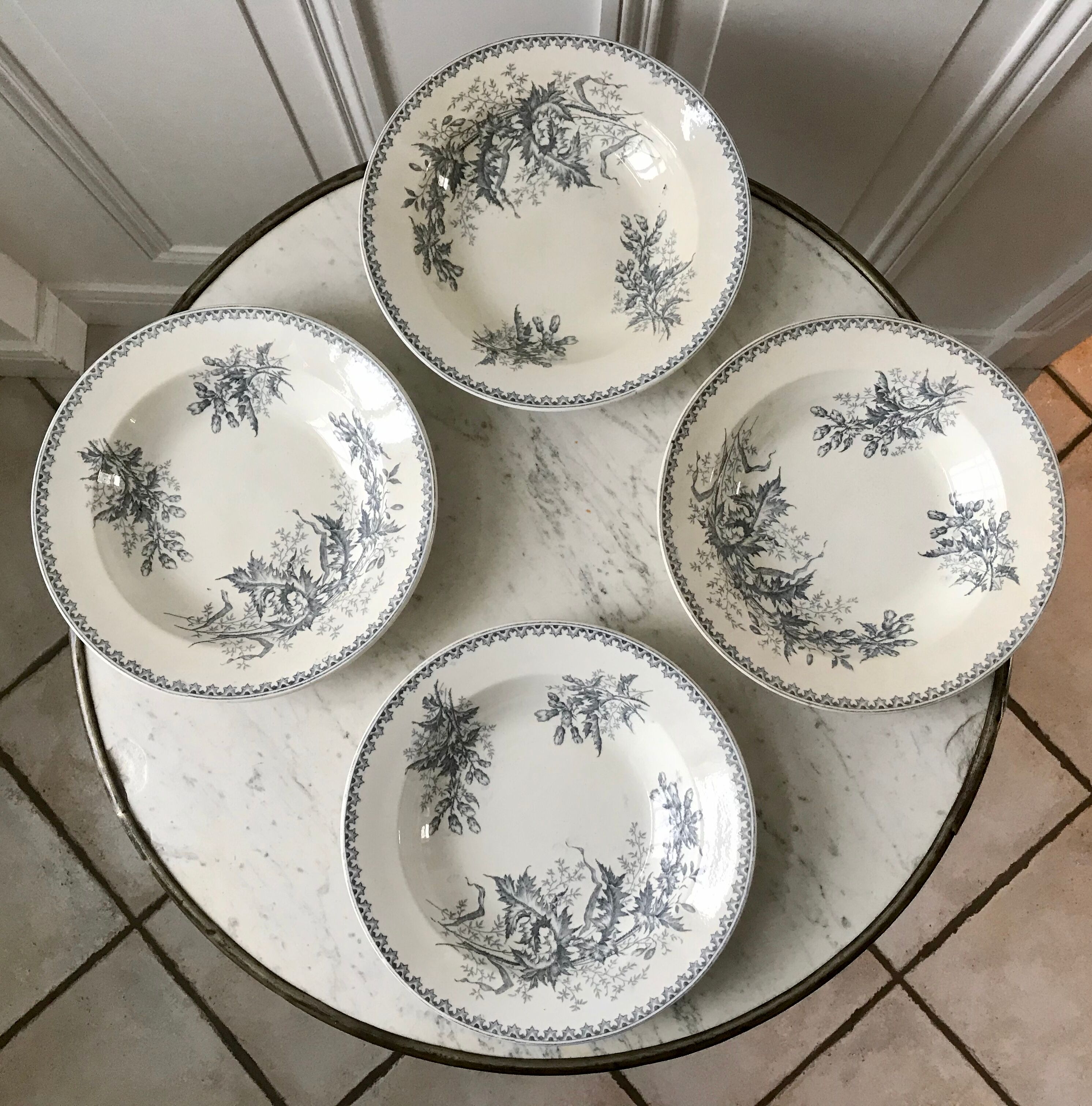 4 hollow plates Terre de Fer Company Ceramics model Thistle made in Holland late nineteenth