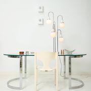 Dining table with a circular base.