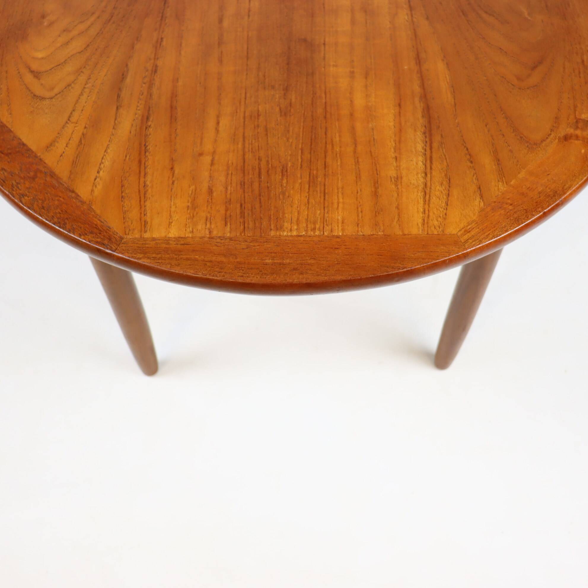 Round teak coffee table