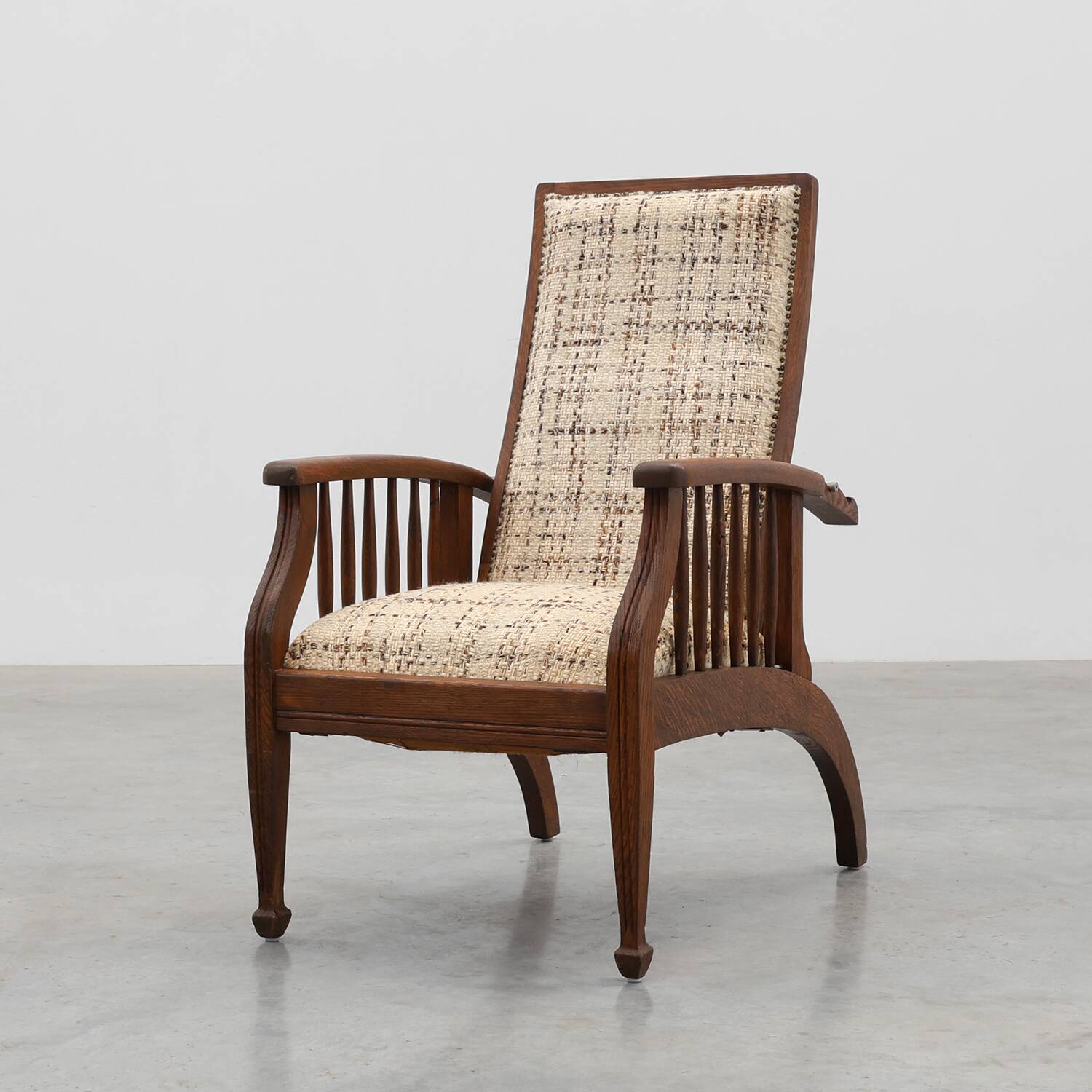 Arts & Craft oak armchair with spindle sides and tweed upholstery, Belgium