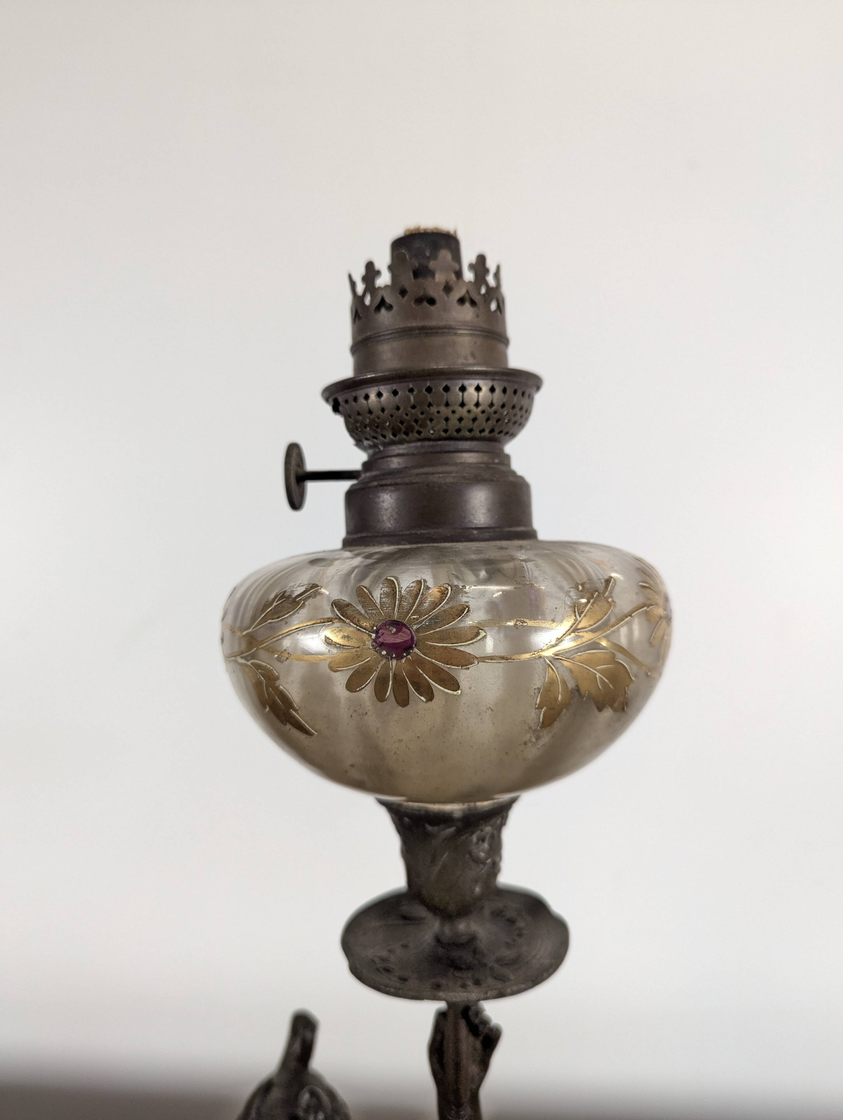 Pair of Art Nouveau oil lamps in cast iron