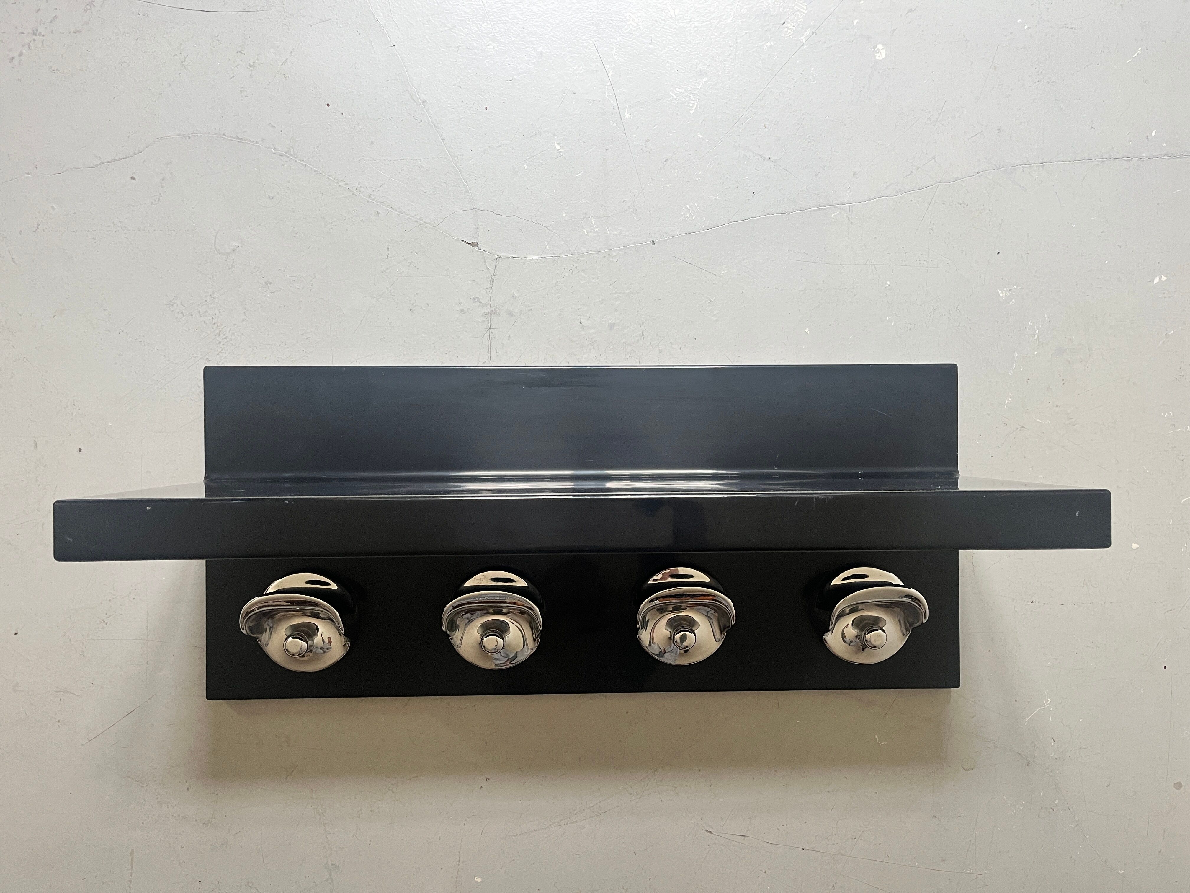 Large black magazine rack by Giotto Stoppino for Kartell, Italy 1970.