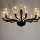Venetian chandelier in Murano glass in black and colourless, 12 light arms, circa 1990.