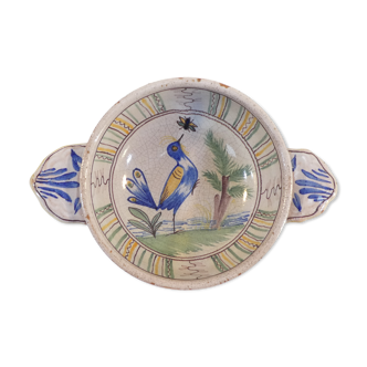 Old bowl with ears in faience decoration to birds