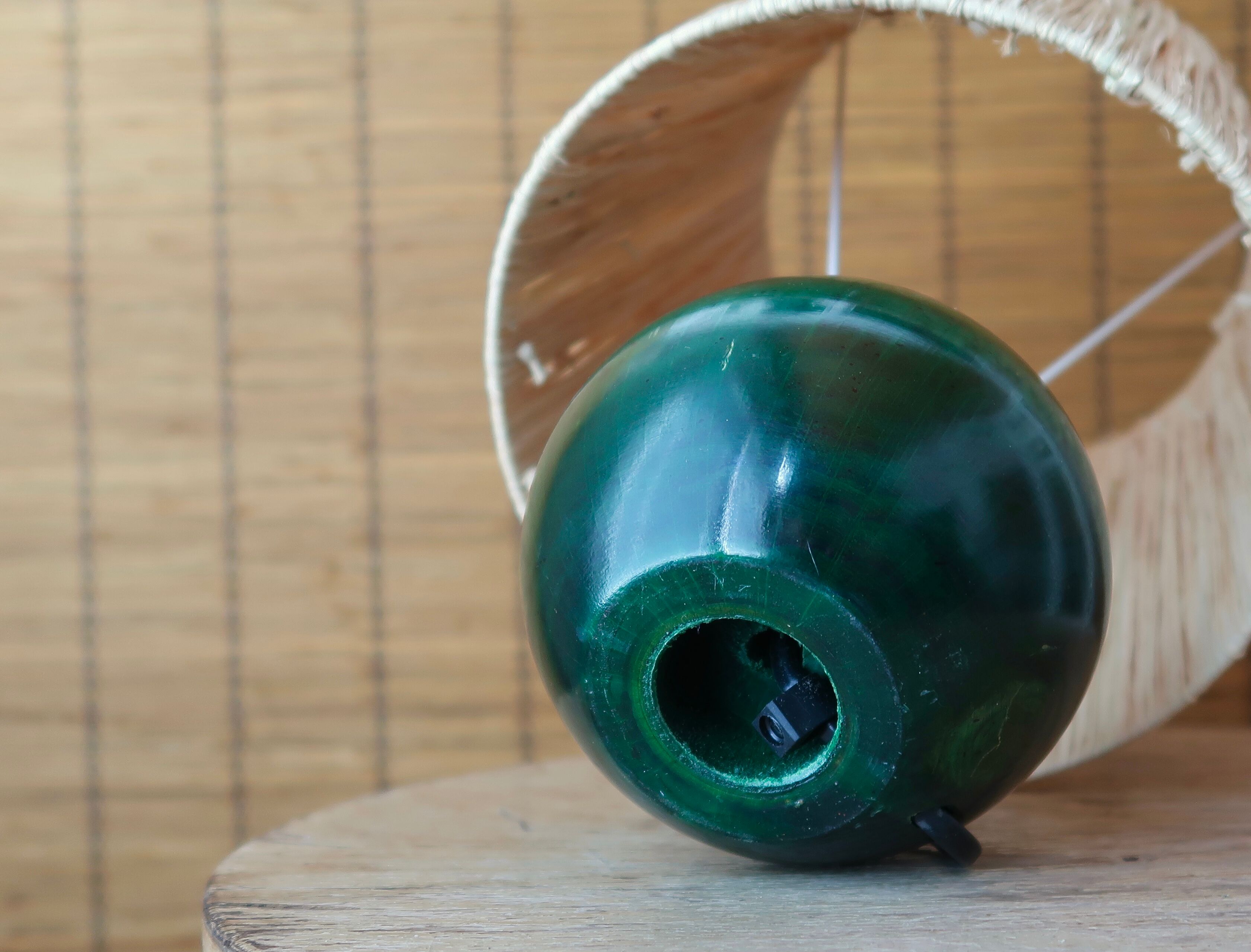 Lamp "ball" in green stained wood, raffia lampshade, 70s