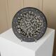 Black ceramic plate with beige geometric relief - 1970s Italian mid-century design