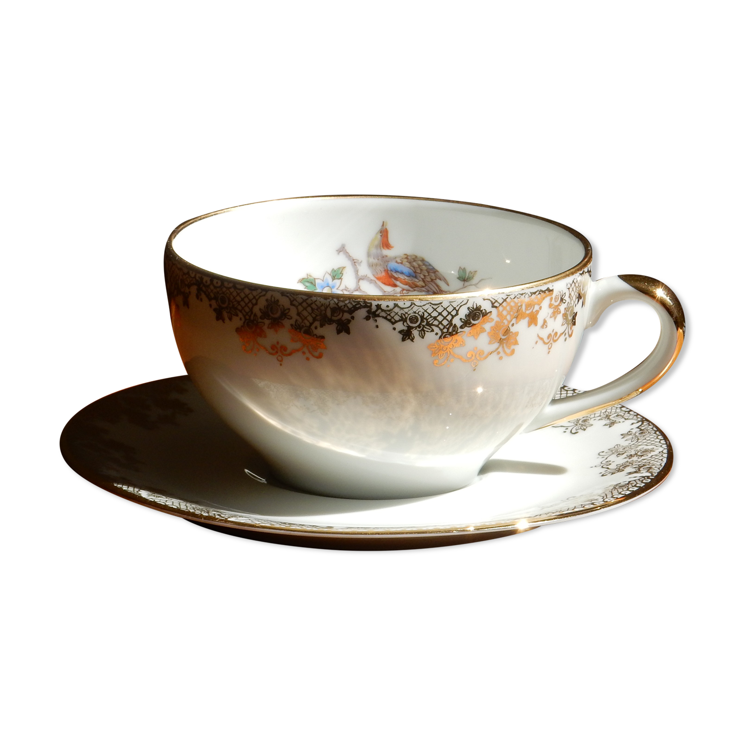 Charles Ahrenfeldt's teacup and subcup limoges