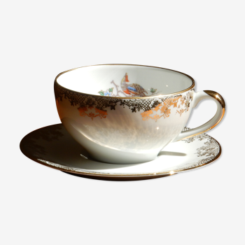 Charles Ahrenfeldt's teacup and subcup limoges