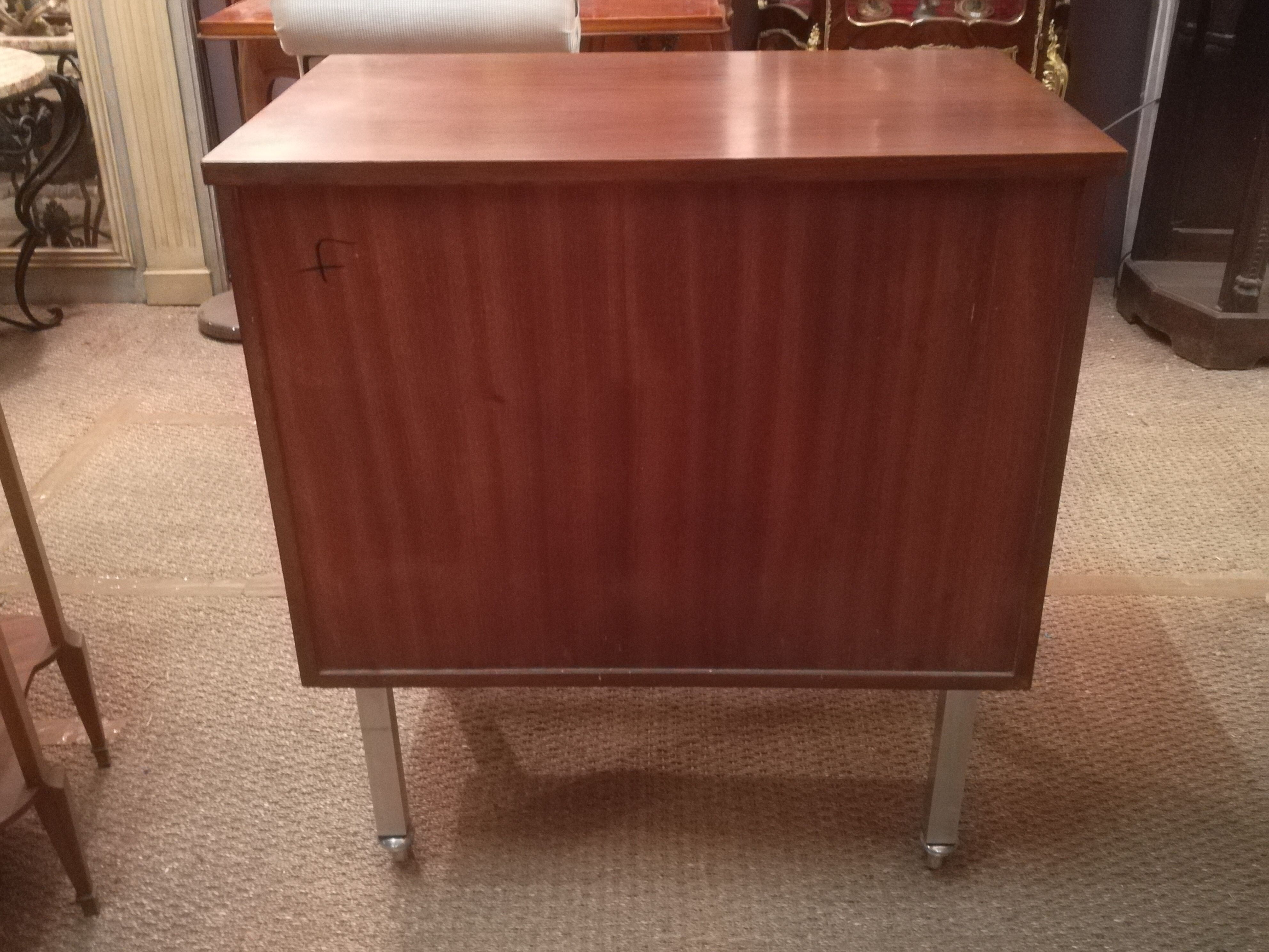 Rosewood and brushed metal chest of drawers