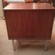 Commode en palissandre et métal brossé