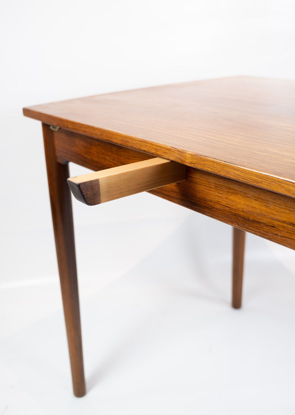 Dining table in rosewood with extentions of danish design from the 1960s