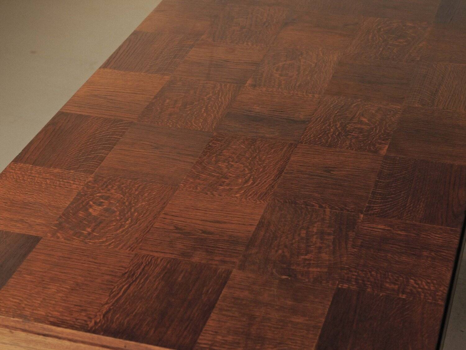 Modernist oak table with a checkerboard top, France, circa 1940.