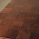 Modernist oak table with a checkerboard top, France, circa 1940.