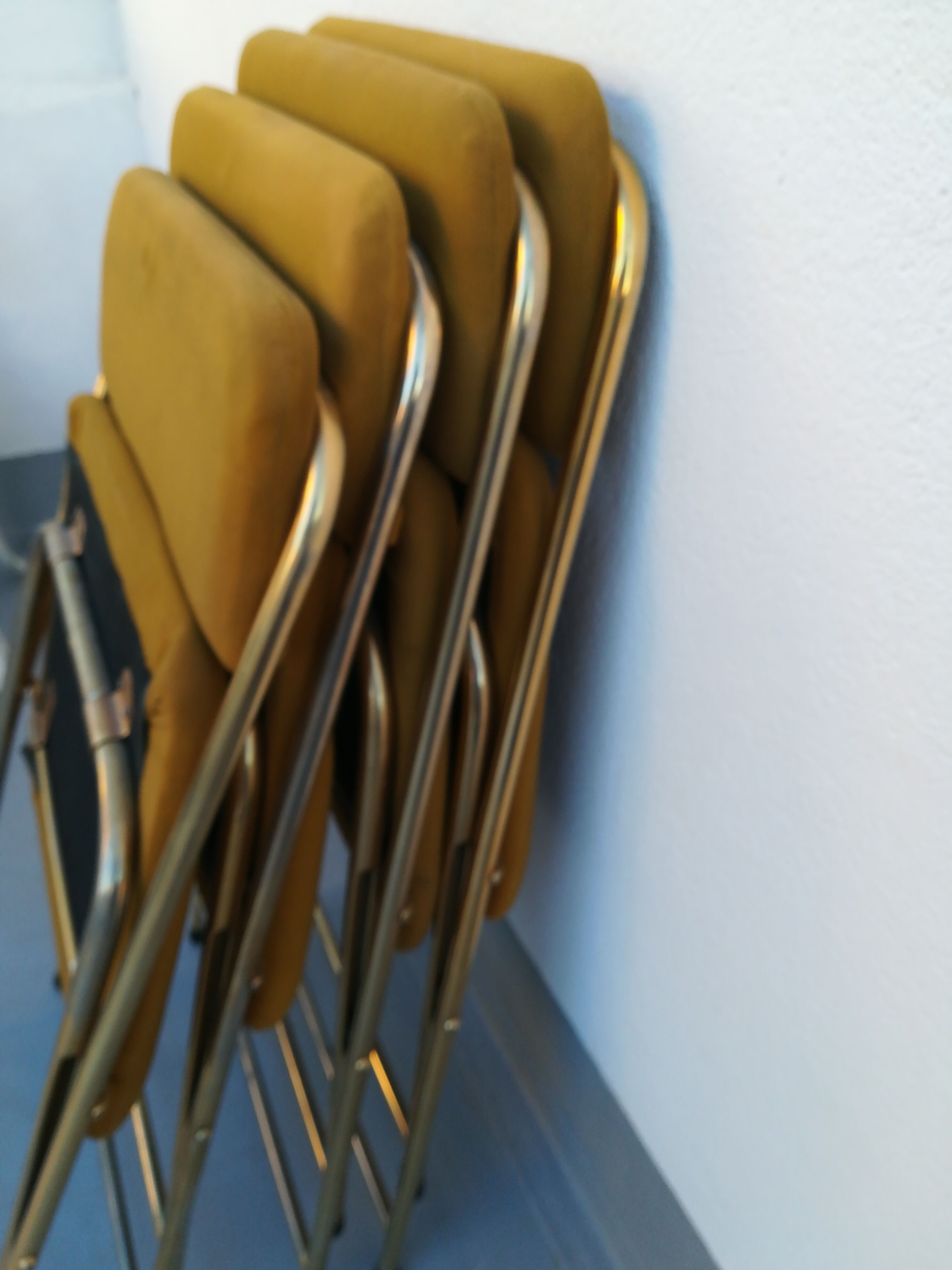 4 folding gold vintage Eyrel chairs