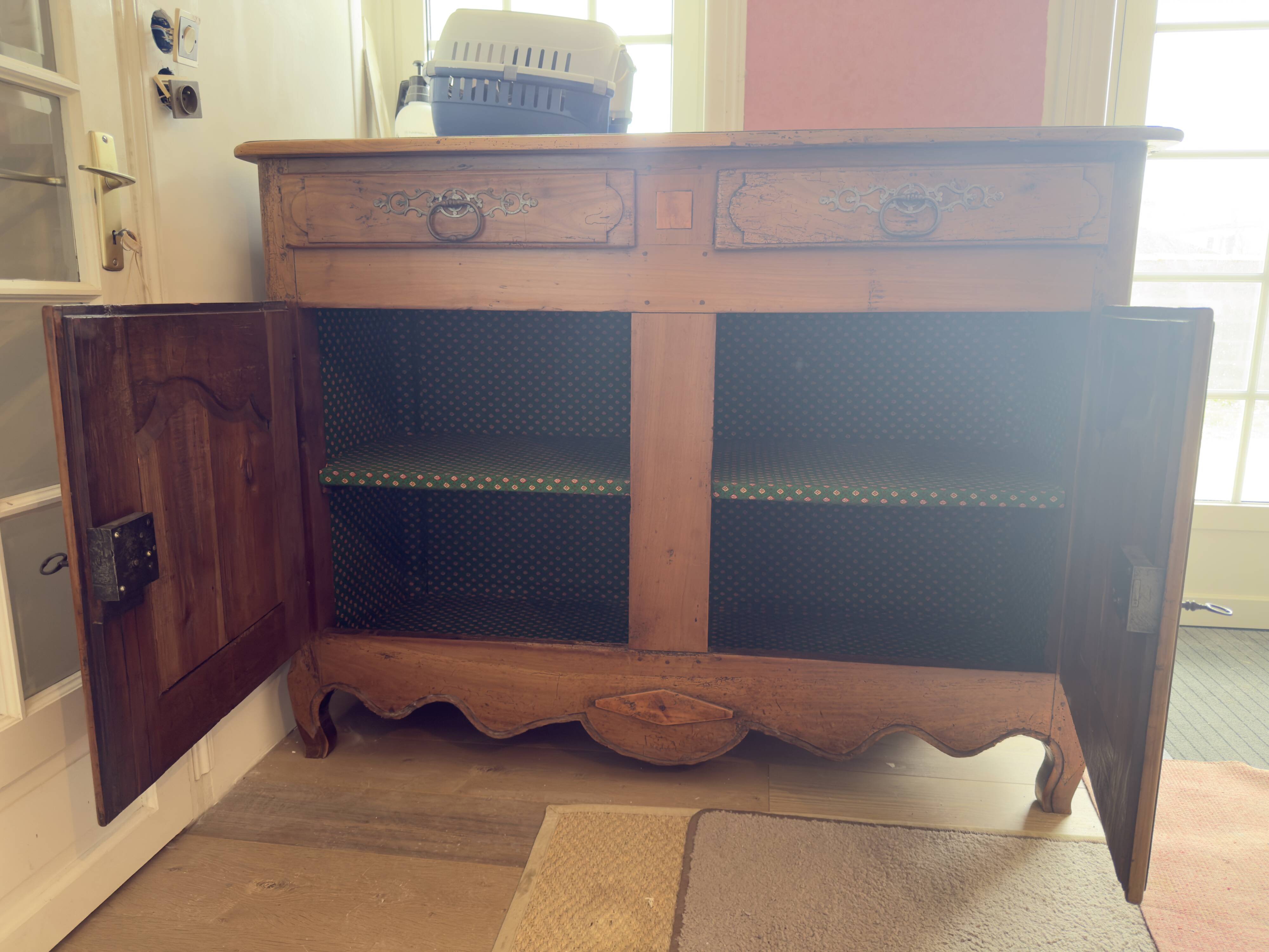 Very old, 2 doors, 2 drawers.