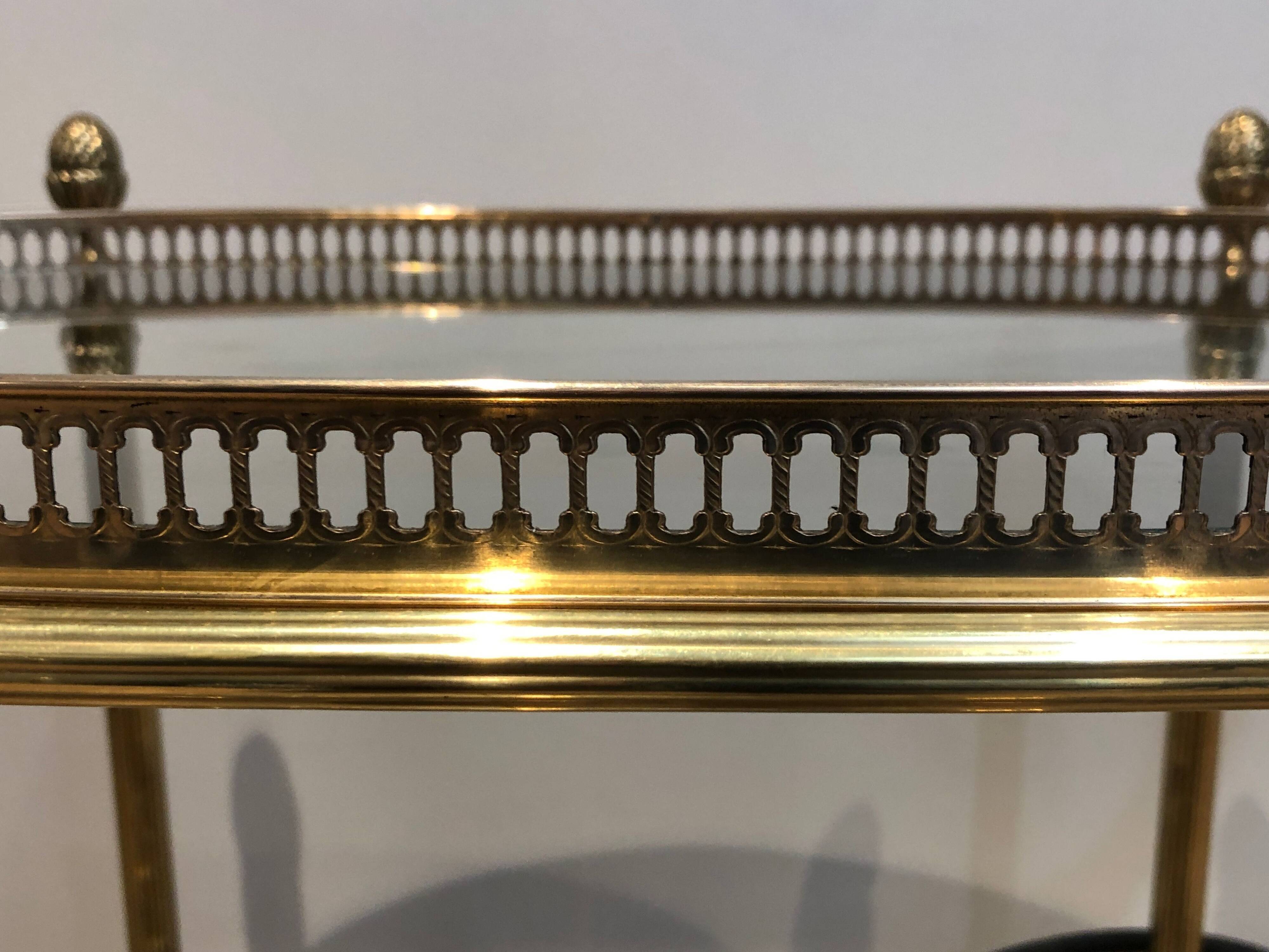 Oval brass trolley from Maison Baguès.