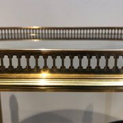Oval brass trolley from Maison Baguès.