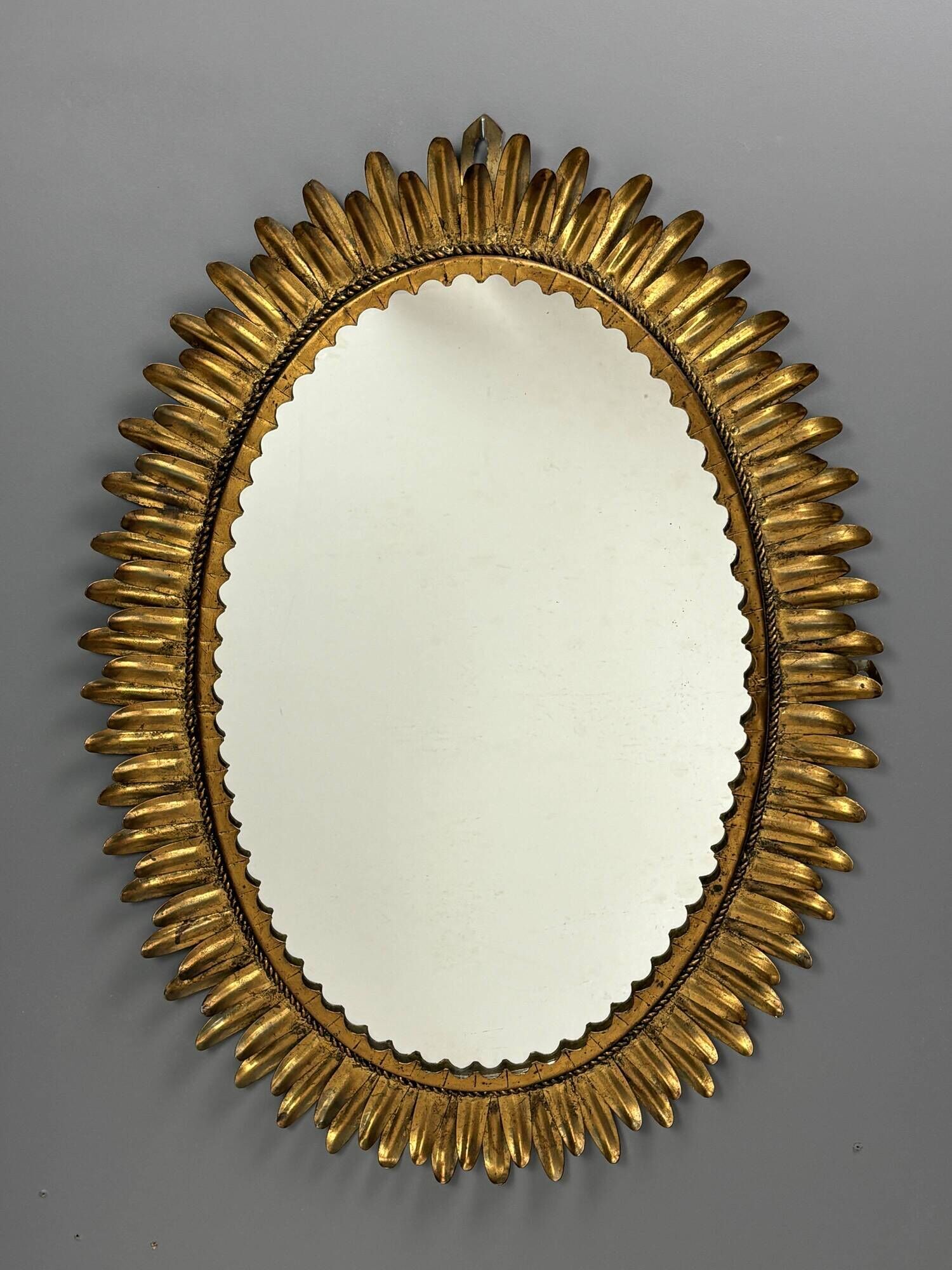 Midcentury bohemian Hollywood Regency Spanish gilt metal sun mirror, 1960s