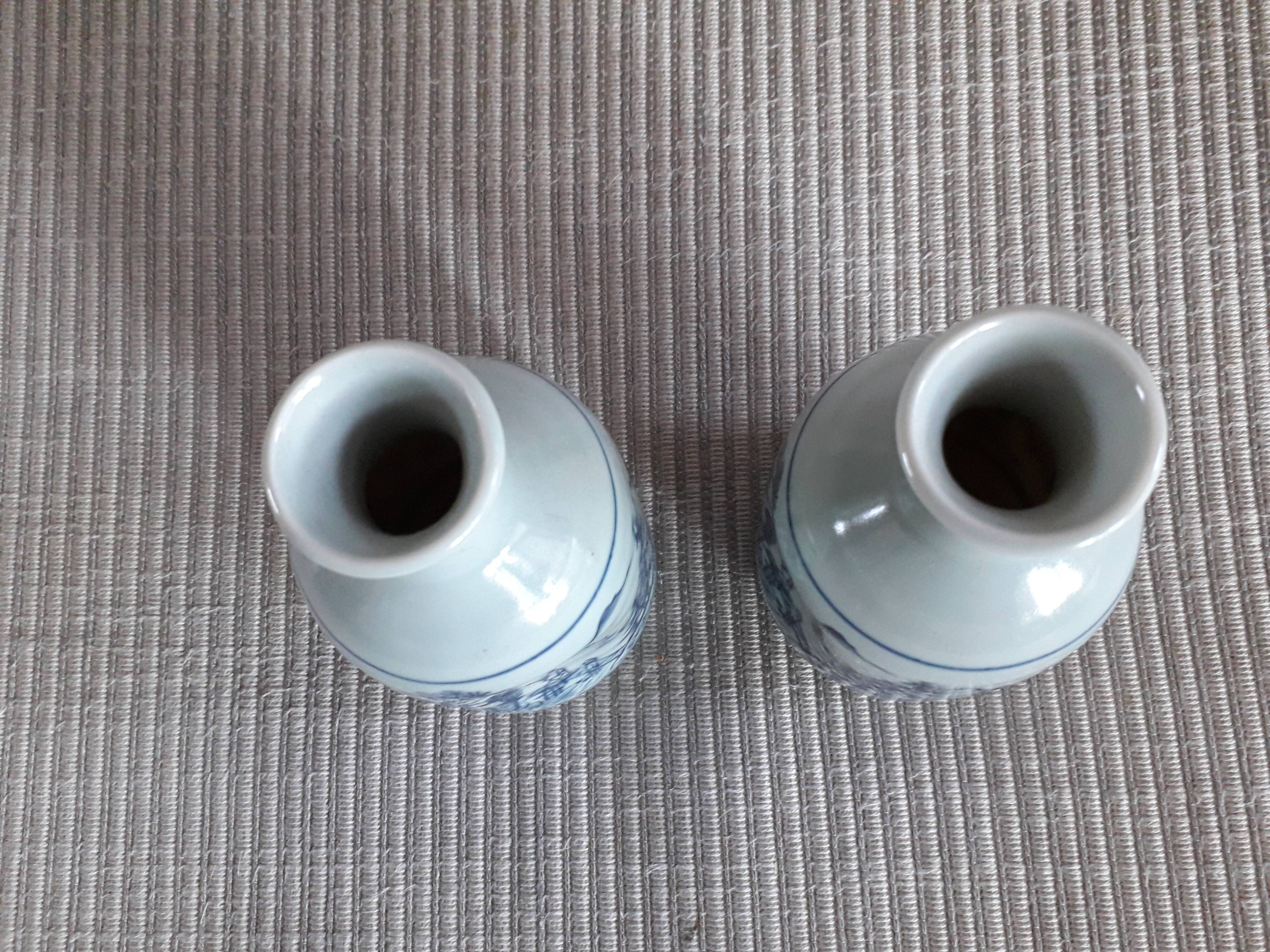 A pair of vintage Chinese ceramic vases signed