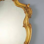 Antique baroque-style mirror in gilded carved wood, Italy 19th century.
