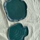 Two dishes empty pocket slurry, biscuits in the shape of vintage green leaf