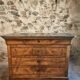 French antique walnut commode with a dark grey marble top, circa 1830–1860.