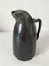 Flamed stoneware pitcher, signed