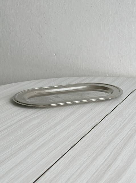 Small vintage tray in lightweight metal