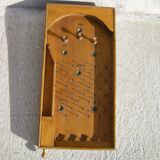 Old nail pinball machine