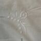 Antique embroidered pillowcase with venetian lace