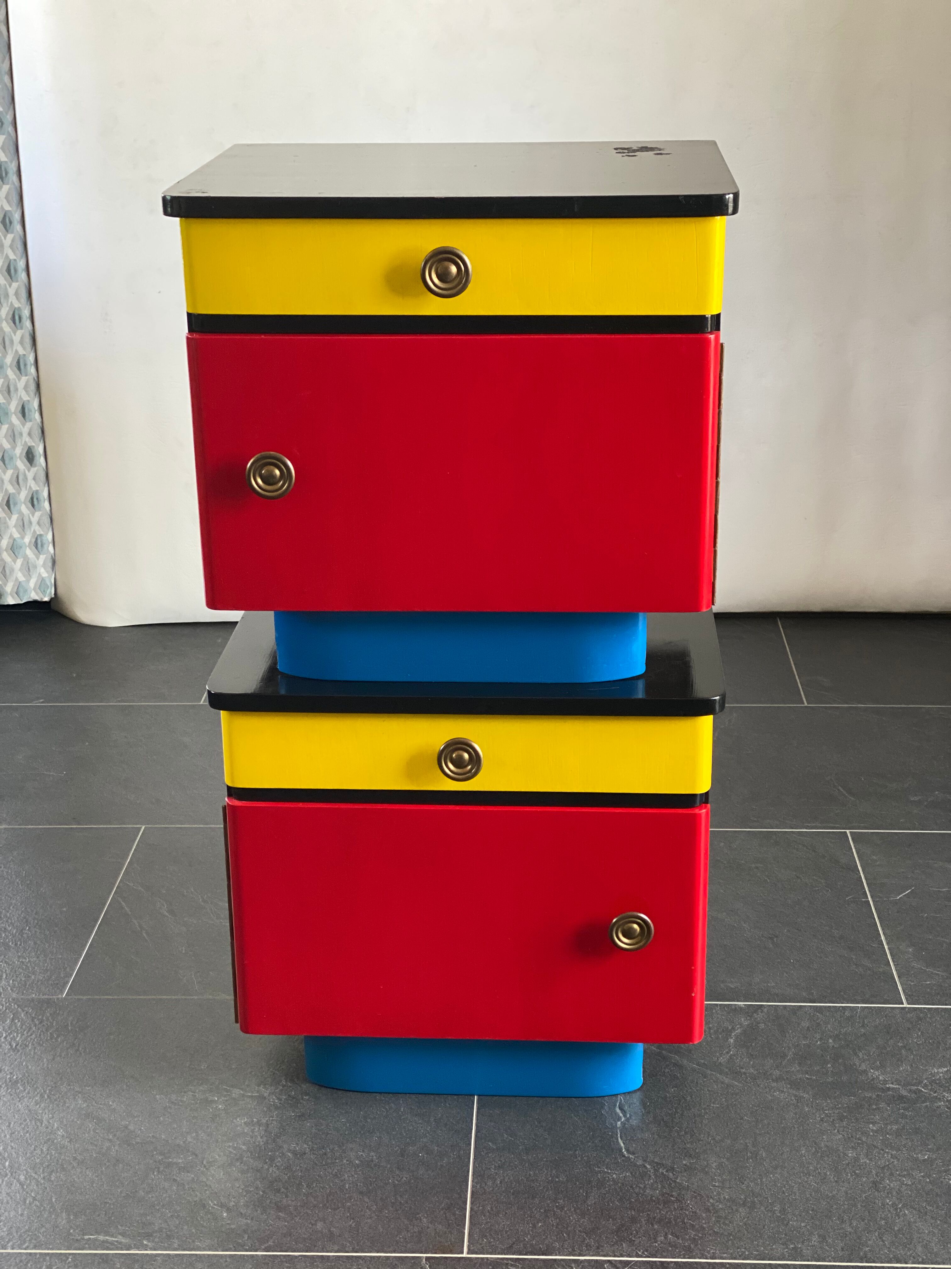 Pair of colorful massive teak night stands